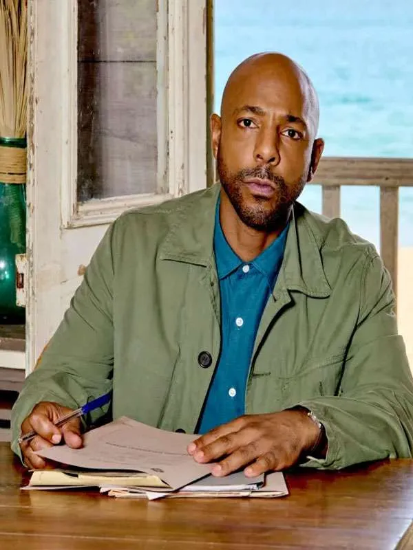 Don Gilet Death in Paradise 2026 Mervin Wilson Green Jacket